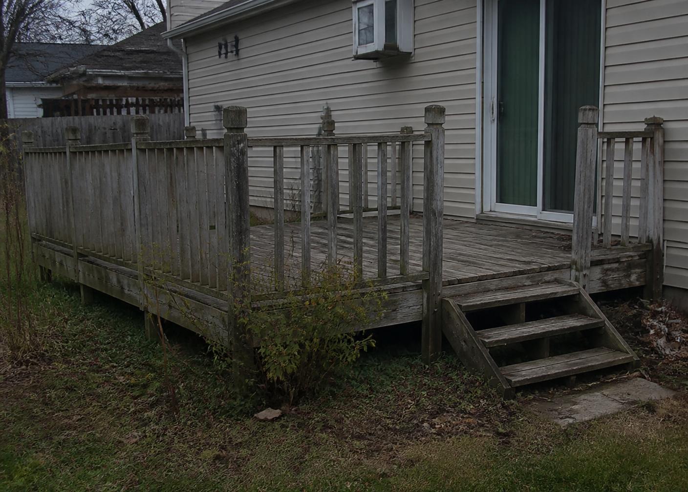 Worn out old wooden deck before replacement